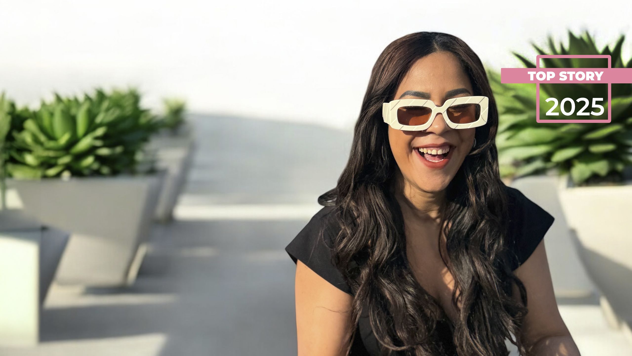 a person taking a picture with a camera on a foggy day